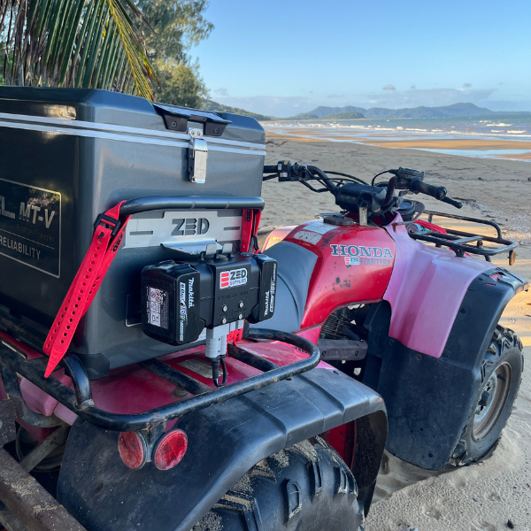 ZED Middle Man battery adapter with Makita battery running an Engel 12V fridge on a quad bike at the beach