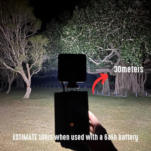 ZED Power Plate LED light beam reaching trees about 30m away at night