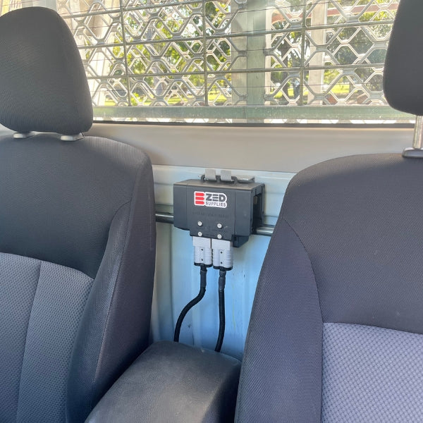 ZED Middle Man mounted on the rear cab wall of a vehicle between the seats